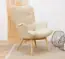 Comfortabele gestoffeerde fauteuil in Scandinavische stijl