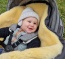 Weerbestendig onder elke omstandigheid - met de lamsvacht-voetenzak Ovina voor de kinderwagen Weerbestendig onder elke omstandigheid - met de lamsvacht-voetenzak Ovina voor de kinderwagen