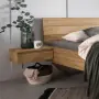 De hangconsole kan eenvoudig aan het bedframe worden gehaakt