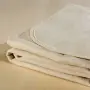 Alèse en molleton absorbante coordonnée au tapis à langer Cotona-Vita