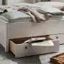 Le tiroir Tusa transforme l'espace mort sous le lit en un précieux espace de rangement